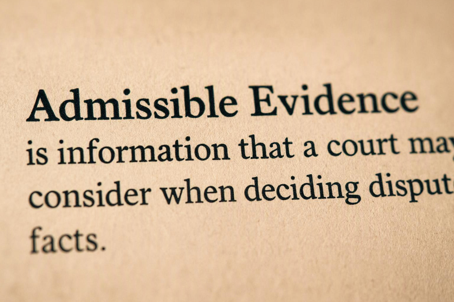Close-up of a printed page showing the heading “Admissible Evidence” and a paragraph of text